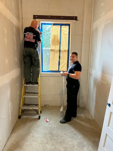 Staff prepping for paint at Station 11, Newport, WA